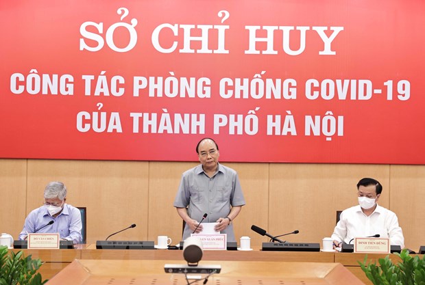 阮春福主席：河内市要全力遏制疫情在社区传播 确保首都的健康安全